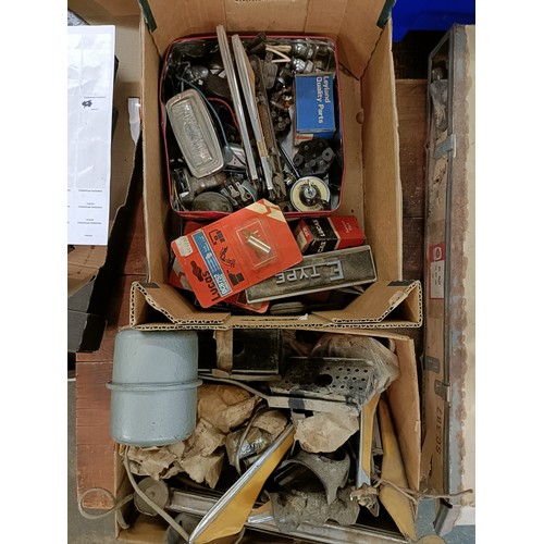 173 - A group of assorted spares, including trafficators and other parts (2 small boxes)