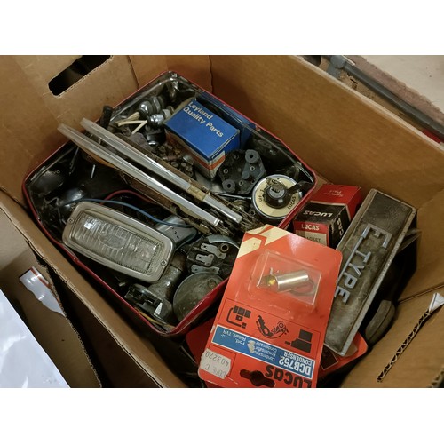 173 - A group of assorted spares, including trafficators and other parts (2 small boxes)