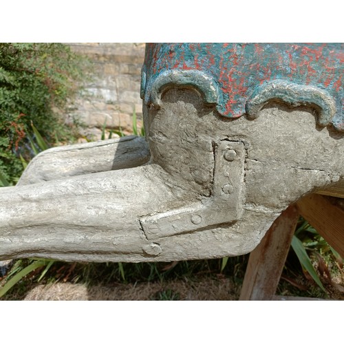 619 - A large and impressive carved wood and painted carousel horse, on a later stand, 190 cm wide