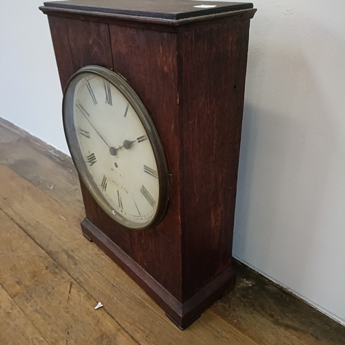 333 - A clock, the painted dial fitted a single fusee movement, in an oak case, 40 cm wide