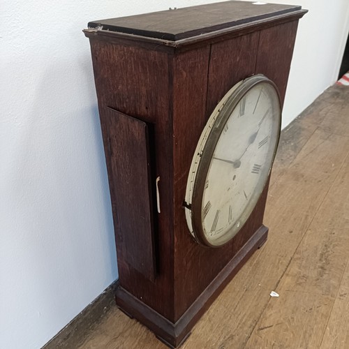 333 - A clock, the painted dial fitted a single fusee movement, in an oak case, 40 cm wide