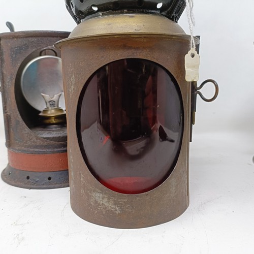 2047 - A BR(W) Paddington type guard's lamp, 32 cm high, and a GWR Paddington type guard's lamp, 33 cm high...
