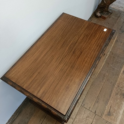 507359 - A 19th century mahogany library table, with two frieze drawers, on a column support to splay legs, 1... 