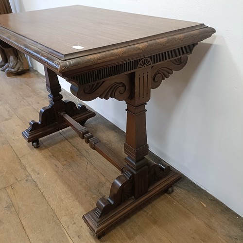 507359 - A 19th century mahogany library table, with two frieze drawers, on a column support to splay legs, 1... 