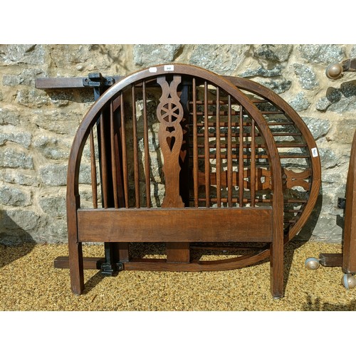 622 - A pair of oak wheel back single bed ends, 93 cm wide (4)