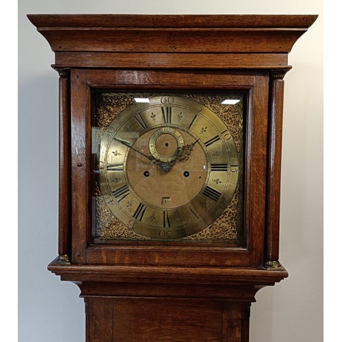 328 - A longcase clock, the brass dial with a subsidiary seconds dial and date aperture, fitted an eight d... 