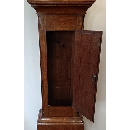 328 - A longcase clock, the brass dial with a subsidiary seconds dial and date aperture, fitted an eight d... 