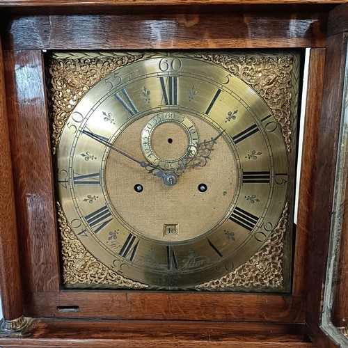 328 - A longcase clock, the brass dial with a subsidiary seconds dial and date aperture, fitted an eight d... 