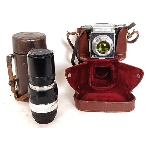 309 - An Agiflex camera and assorted other photographic equipment, in a suitcase