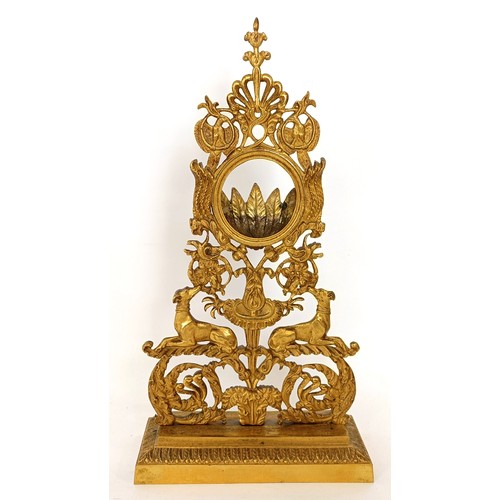 313 - A gilt metal watch stand, with floral and dog supports, 27.5 cm high
