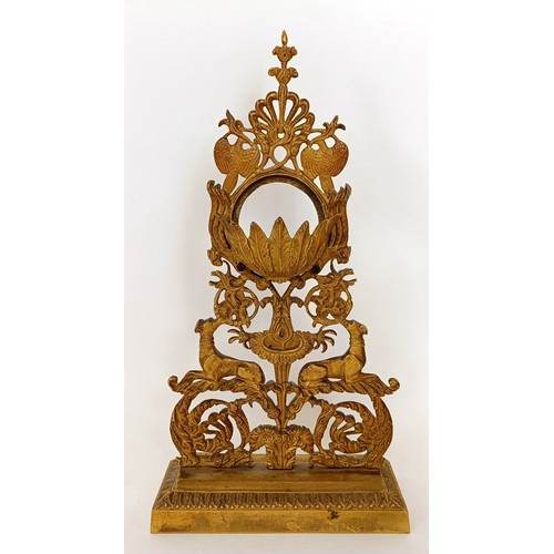 313 - A gilt metal watch stand, with floral and dog supports, 27.5 cm high