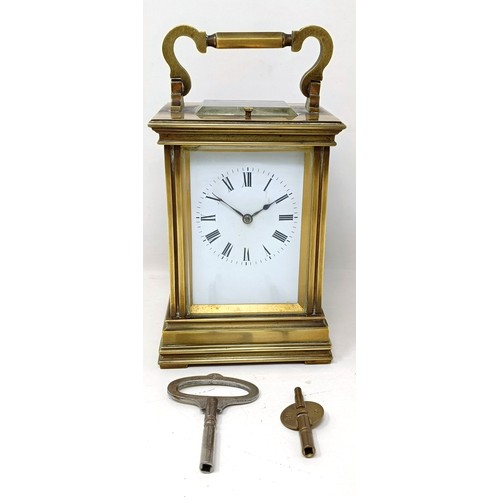 317 - A carriage clock, with a repeat, 18 cm high