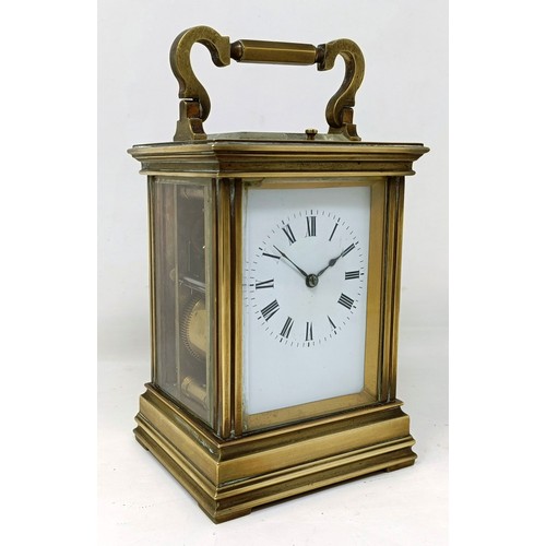 317 - A carriage clock, with a repeat, 18 cm high