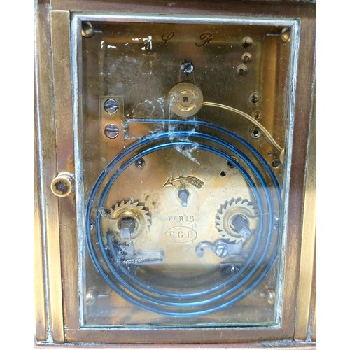 317 - A carriage clock, with a repeat, 18 cm high