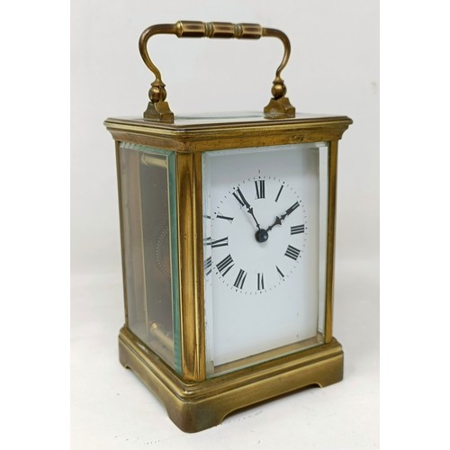 316 - A carriage clock, 16 cm high