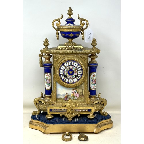 332 - A mantel clock, the porcelain dial decorated flowers, fitted an eight day movement, striking on a be... 