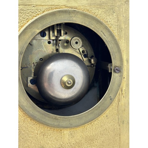 332 - A mantel clock, the porcelain dial decorated flowers, fitted an eight day movement, striking on a be... 