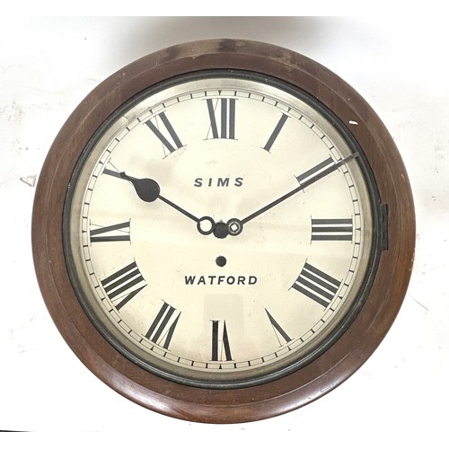 334 - A wall clock, with a painted dial, reading Sims Watford, with a eight day fusee movement, in a mahog... 