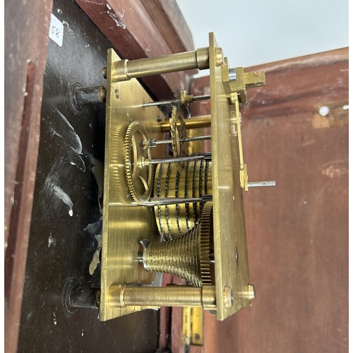 334 - A wall clock, with a painted dial, reading Sims Watford, with a eight day fusee movement, in a mahog... 
