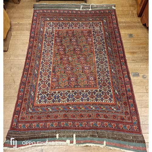 624 - A Persian type carpet, central rectangular medallion, with repeating floral motifs, 216 x 127 cm