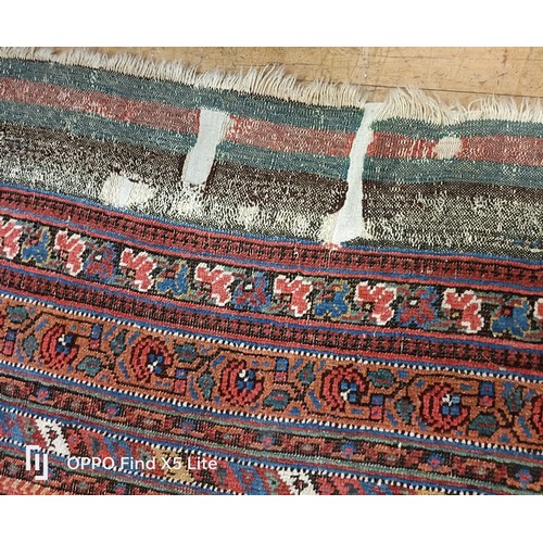 624 - A Persian type carpet, central rectangular medallion, with repeating floral motifs, 216 x 127 cm