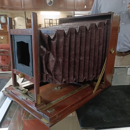 307 - A plate camera, in two canvas bags (2)