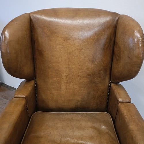 965 - A 19th century invalids reclining leather upholstered armchair, with brass mounts and wheels, J Ward... 