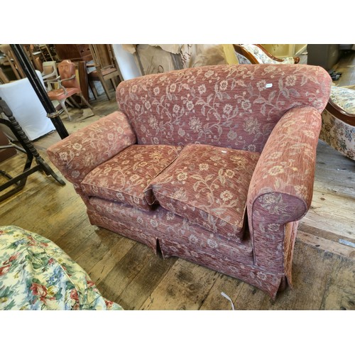 973 - A modern two seater sofa, 152 cm wide