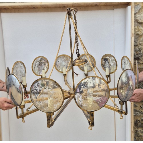 998 - A large gilt metal and mirrored chandelier, with corded supports, 105 cm diameter