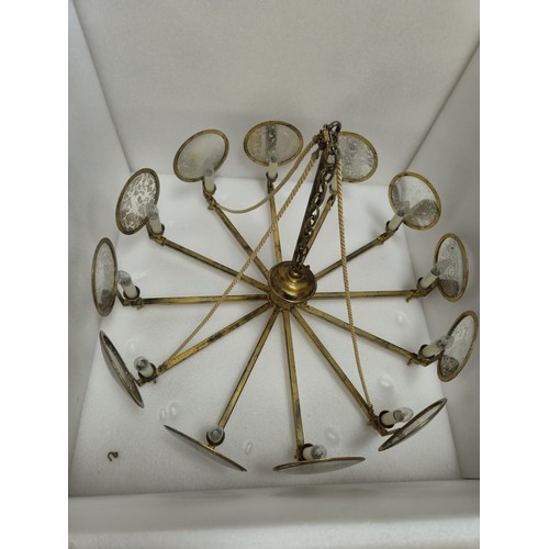 998 - A large gilt metal and mirrored chandelier, with corded supports, 105 cm diameter