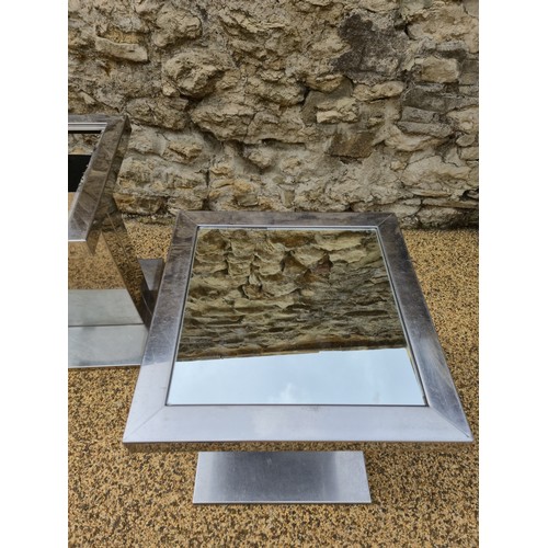1013 - A pair of aluminium side tables, 60 cm high, 50 cm wide, one mirror top missing