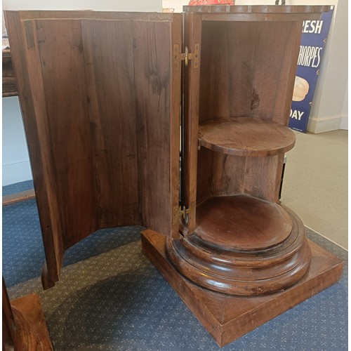 1017 - A pair of walnut bedside cupboards, in the form of fluted columns, 40 cm diameter, 89 cm high