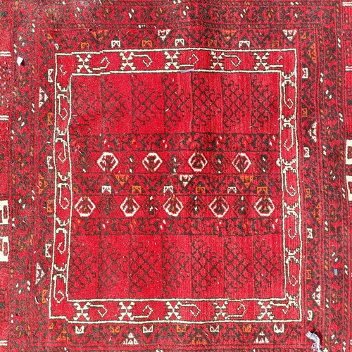 966 - A red ground carpet, 254 cm x 166 cm, and a blue ground rug, 193 cm x 132 cm (2)
