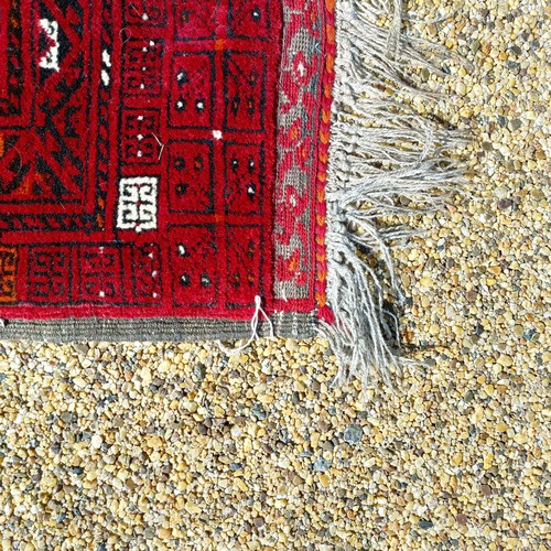 966 - A red ground carpet, 254 cm x 166 cm, and a blue ground rug, 193 cm x 132 cm (2)