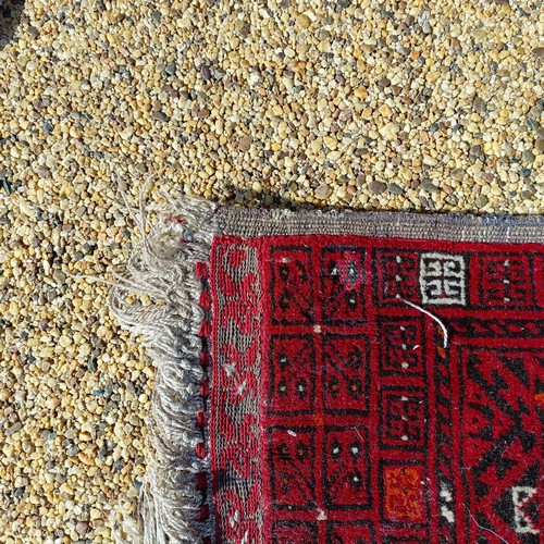 966 - A red ground carpet, 254 cm x 166 cm, and a blue ground rug, 193 cm x 132 cm (2)