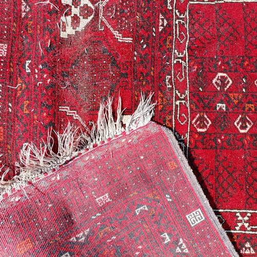 966 - A red ground carpet, 254 cm x 166 cm, and a blue ground rug, 193 cm x 132 cm (2)