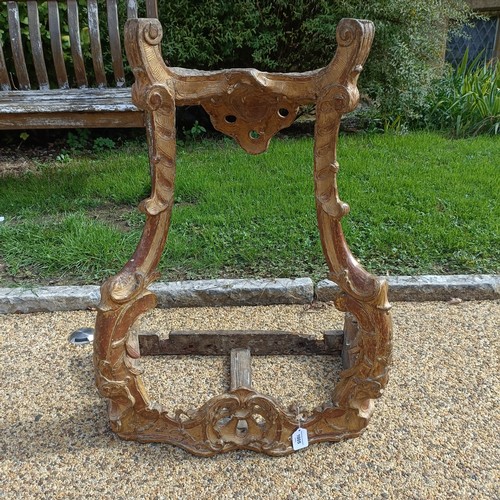 1005 - A 19th century carved wood and gesso pier table, in the rococo manner, 58 cm wide, lacking a marble ... 