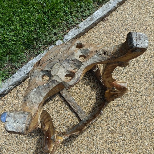 1005 - A 19th century carved wood and gesso pier table, in the rococo manner, 58 cm wide, lacking a marble ... 