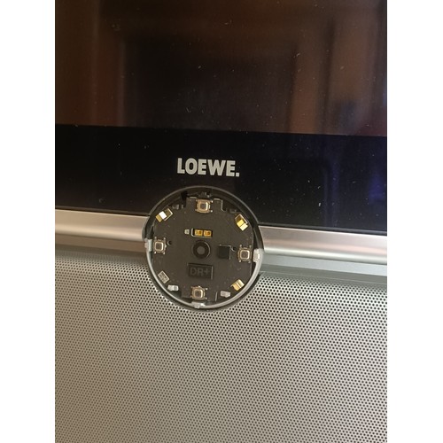 1007 - A Leowe flat screen 46 inch TV, with a sound bar