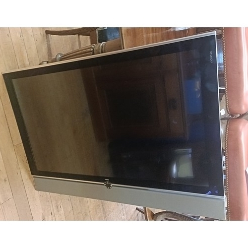 1007 - A Leowe flat screen 46 inch TV, with a sound bar