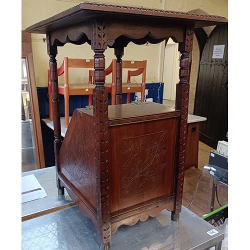 978 - An aesthetic period walnut coal purdonium, carved foliate forms, 60 cm high x 34 cm wide