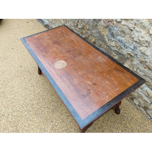 993 - Attributed to George Faulkner Armitage, a mahogany and ebonised library table, with two frieze drawe... 