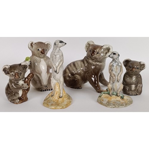 70 - A Beswick Koala Bear, 1038, three others, 1039, 1040 and 1089, and two Meerkats, 3568 and 3571, all ... 