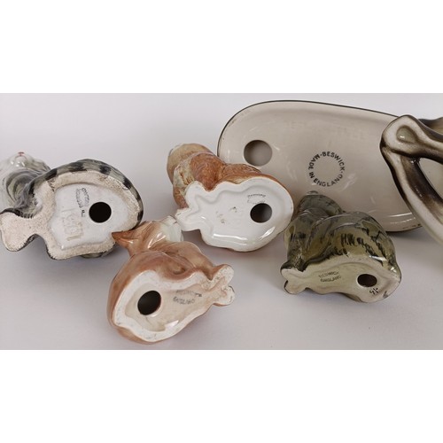 71 - A Beswick Persian Kitten, seated, ginger striped, 1886, a Cat, grey striped, 1031, two Kittens, ging... 