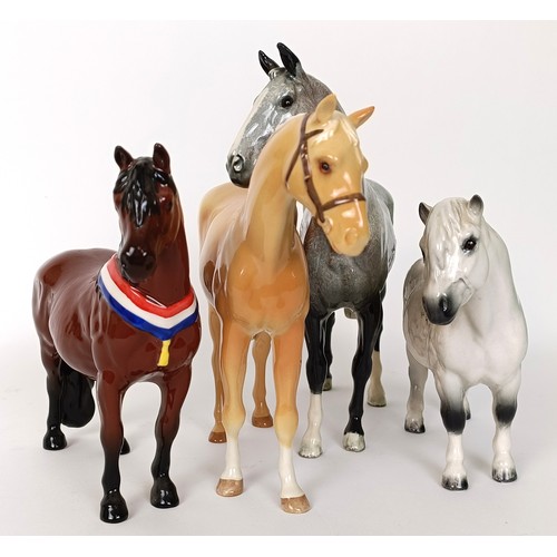 75 - A Beswick Hunter, grey, H260, (boxed) a Palomino, H259, Another Bunch, (boxed) and a Royal Doulton S... 