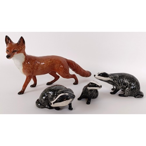 116 - A Beswick Badger Cub, 3392, and two others, 3393 and 3394, and a Fox, 1016A, all gloss (4)