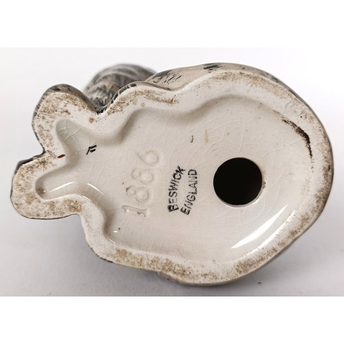 64 - A Beswick Persian Kitten, seated, looking up, grey Swiss roll, 1886, gloss