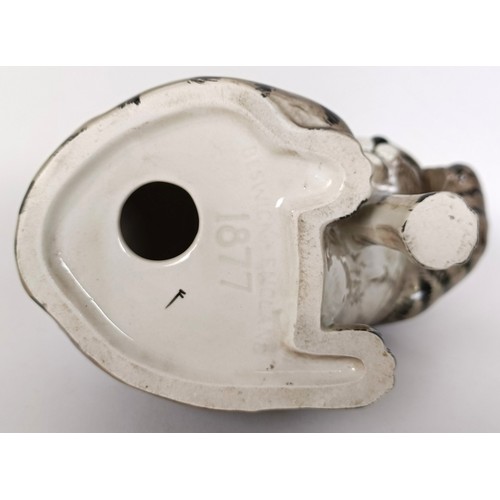 65 - A Beswick Cat, seated scratching ear, grey Swiss roll, 1877, gloss