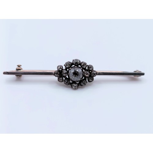 660 - A diamond bar brooch