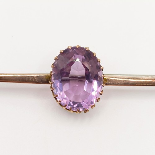 661 - A 9ct gold and amethyst bar brooch, and a yellow metal, tourmaline, peridot and seed pearl brooch (2... 